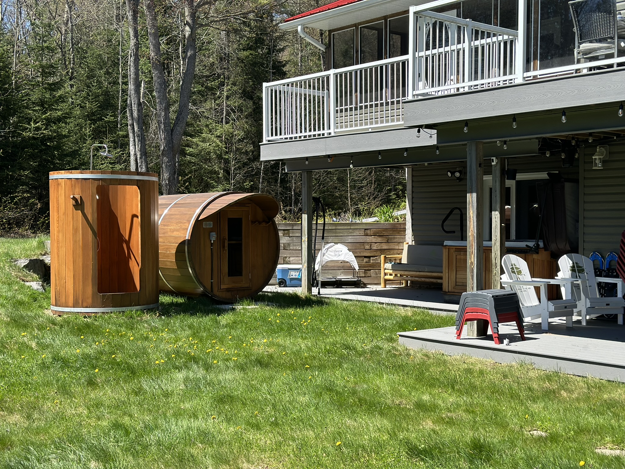 a photo of an outdoor shower and sauna