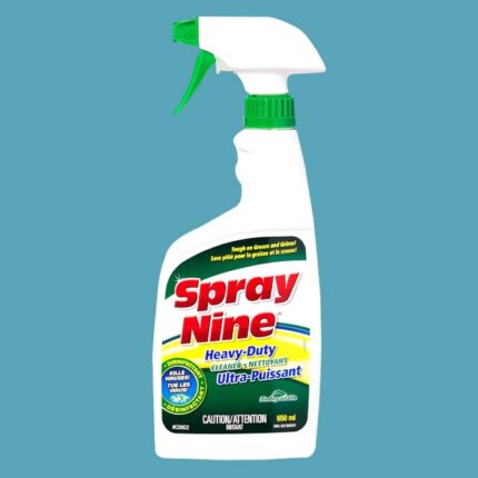 a cleaning spray on a teal background