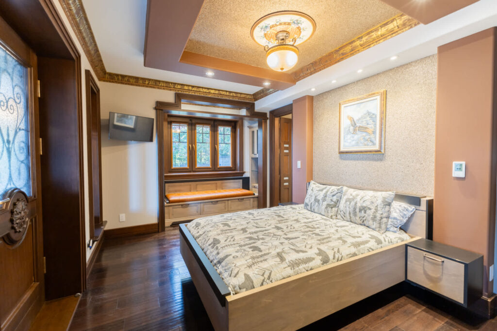 A bed in a beige room