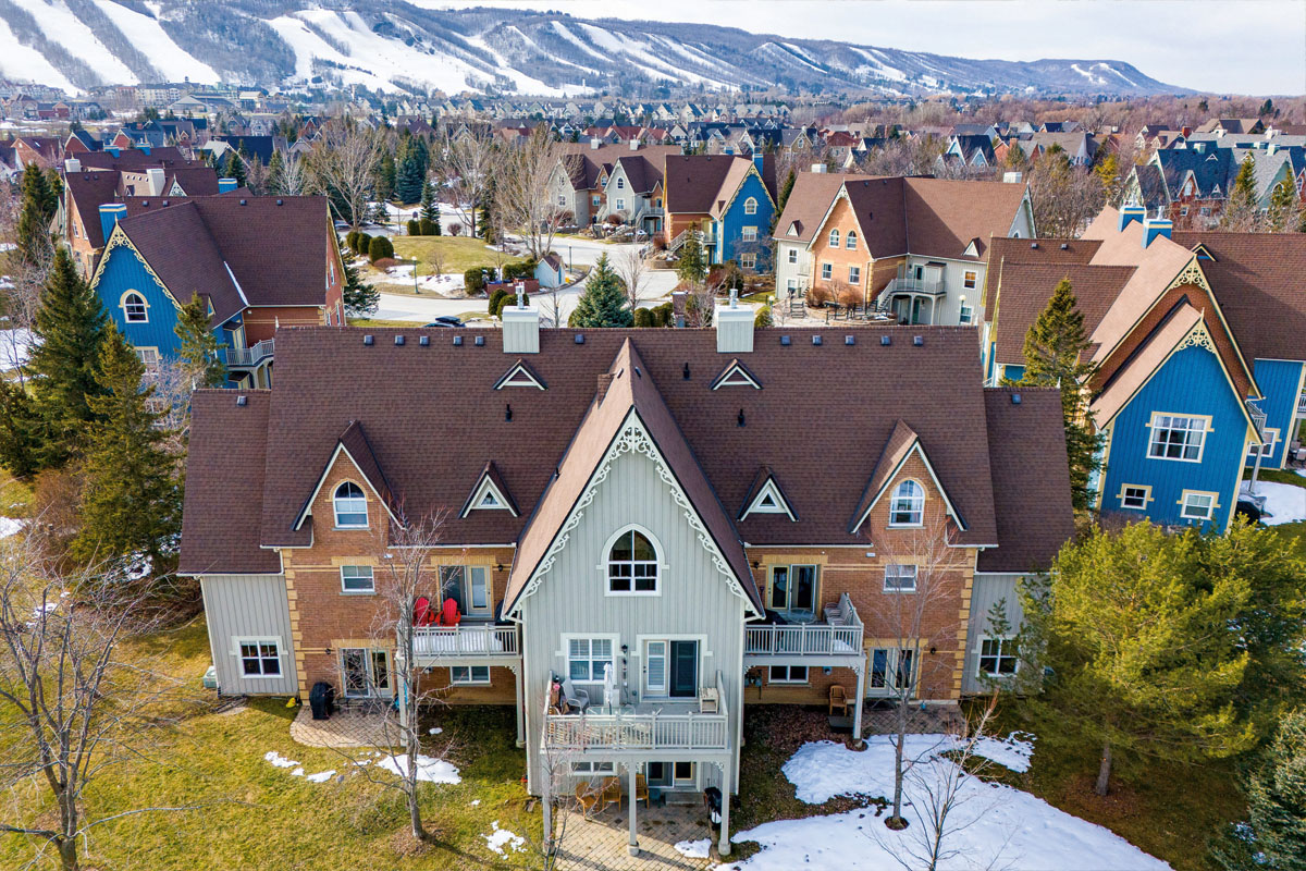 an aerial shot of a ski chalet in the blue mountains