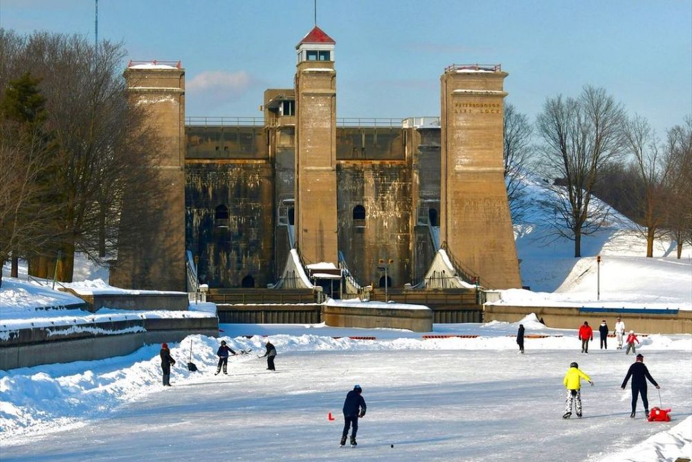 People skating on the Trent Canal on a sunny day near Peterborough, Ont.
