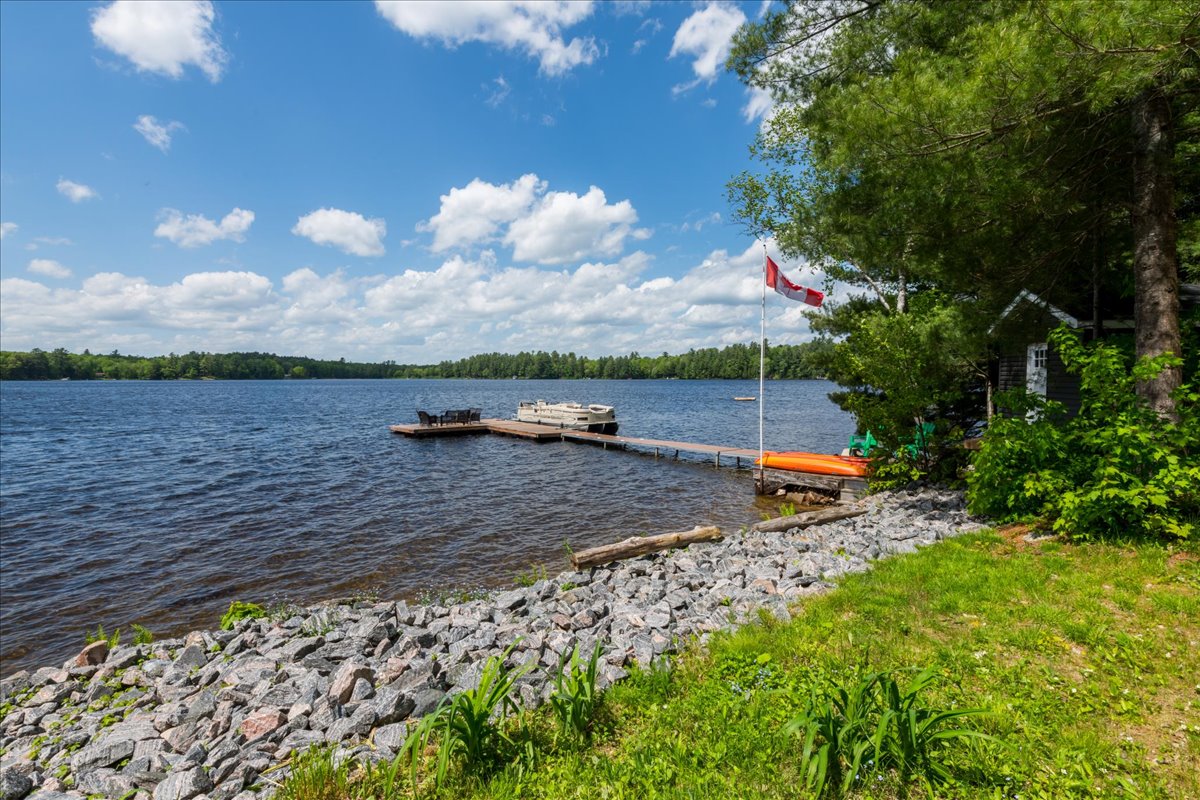A rocky shoreline along Pine Lake