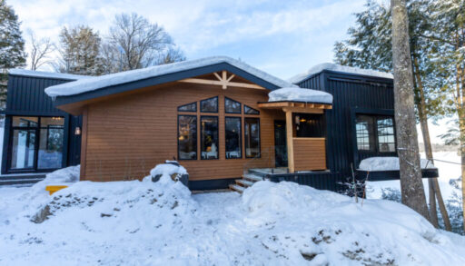 A brown and black wood panelled cottage