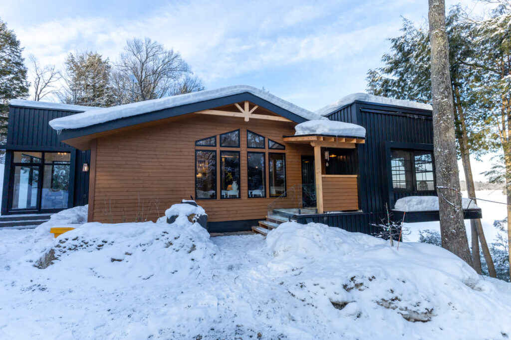 A brown and black wood panelled cottage
