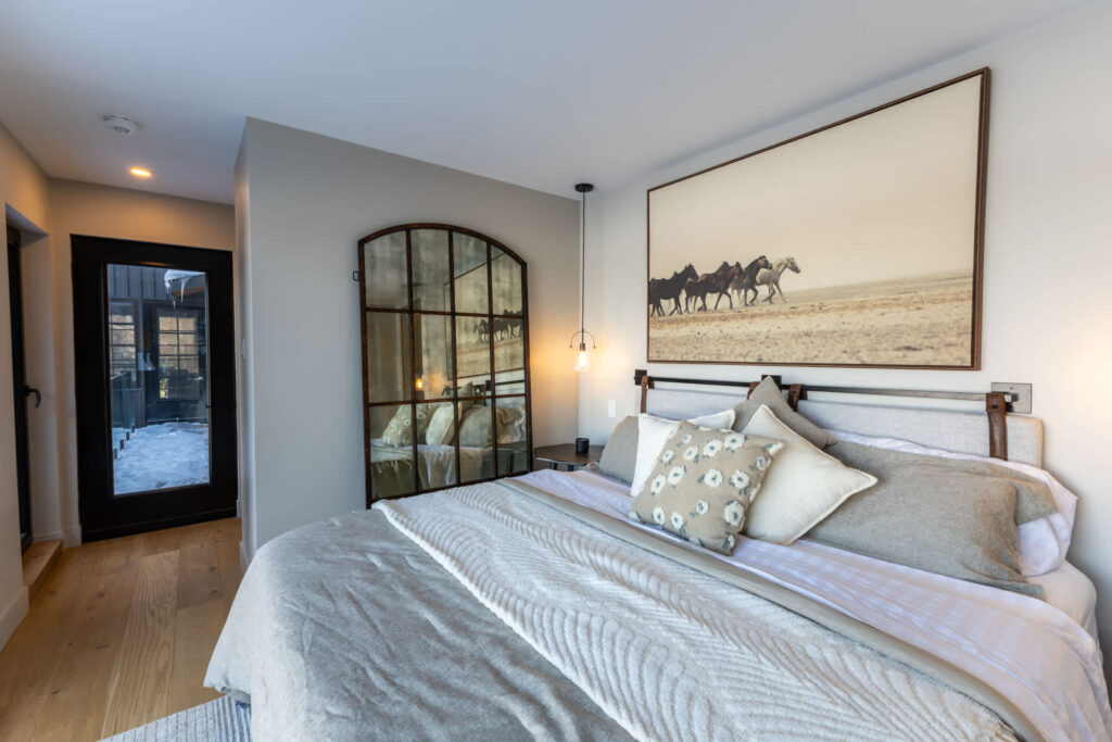 A large white next to a barn-style mirror