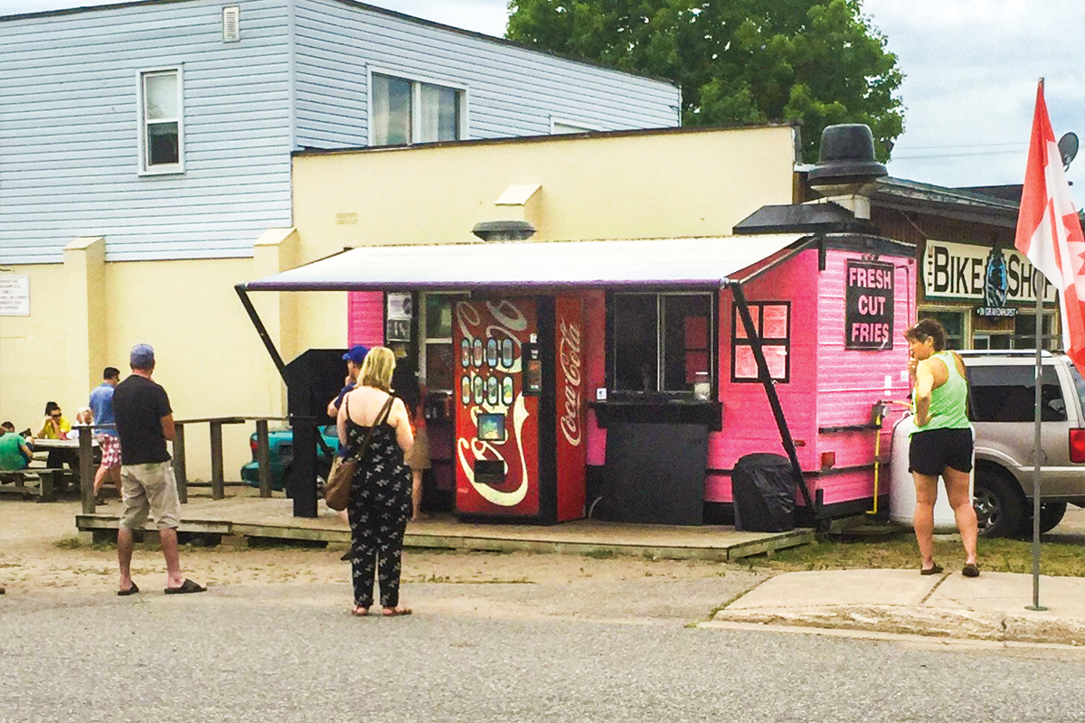 a photo of a pink chip truck