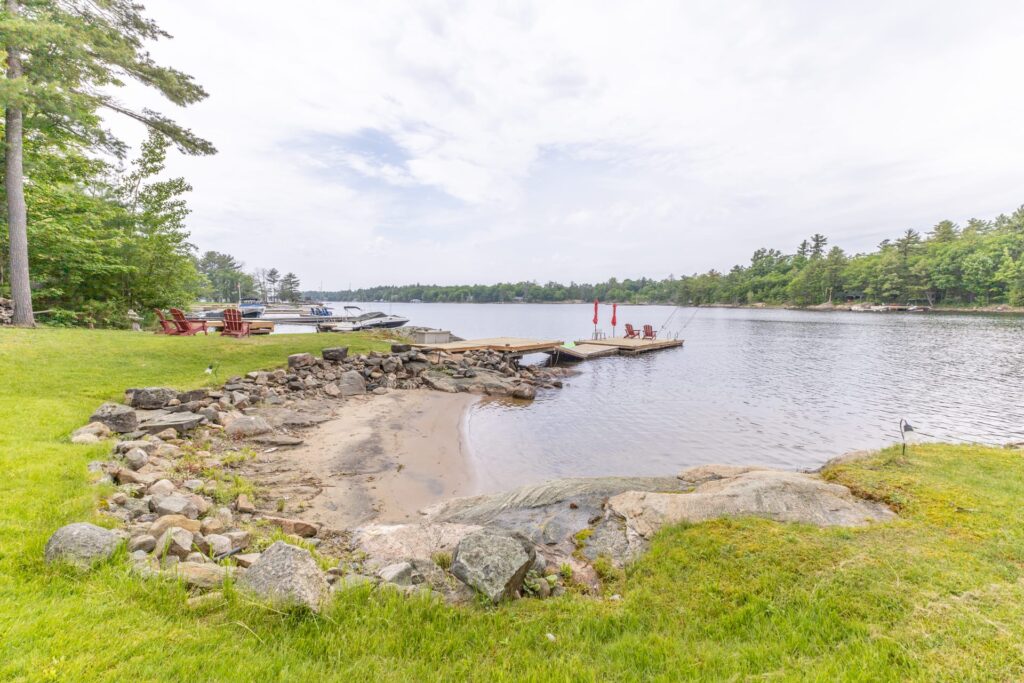 A small sandy beach on a lake