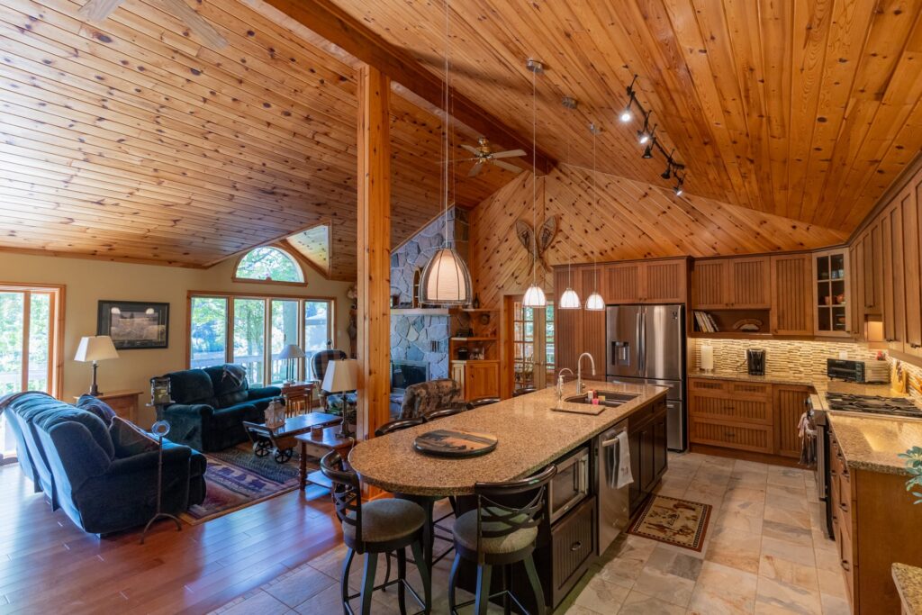 A rounded kitchen island in a wood kitchen