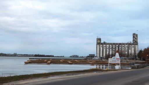 Grain terminals that read 'Collingwood Terminals Limited' on the water