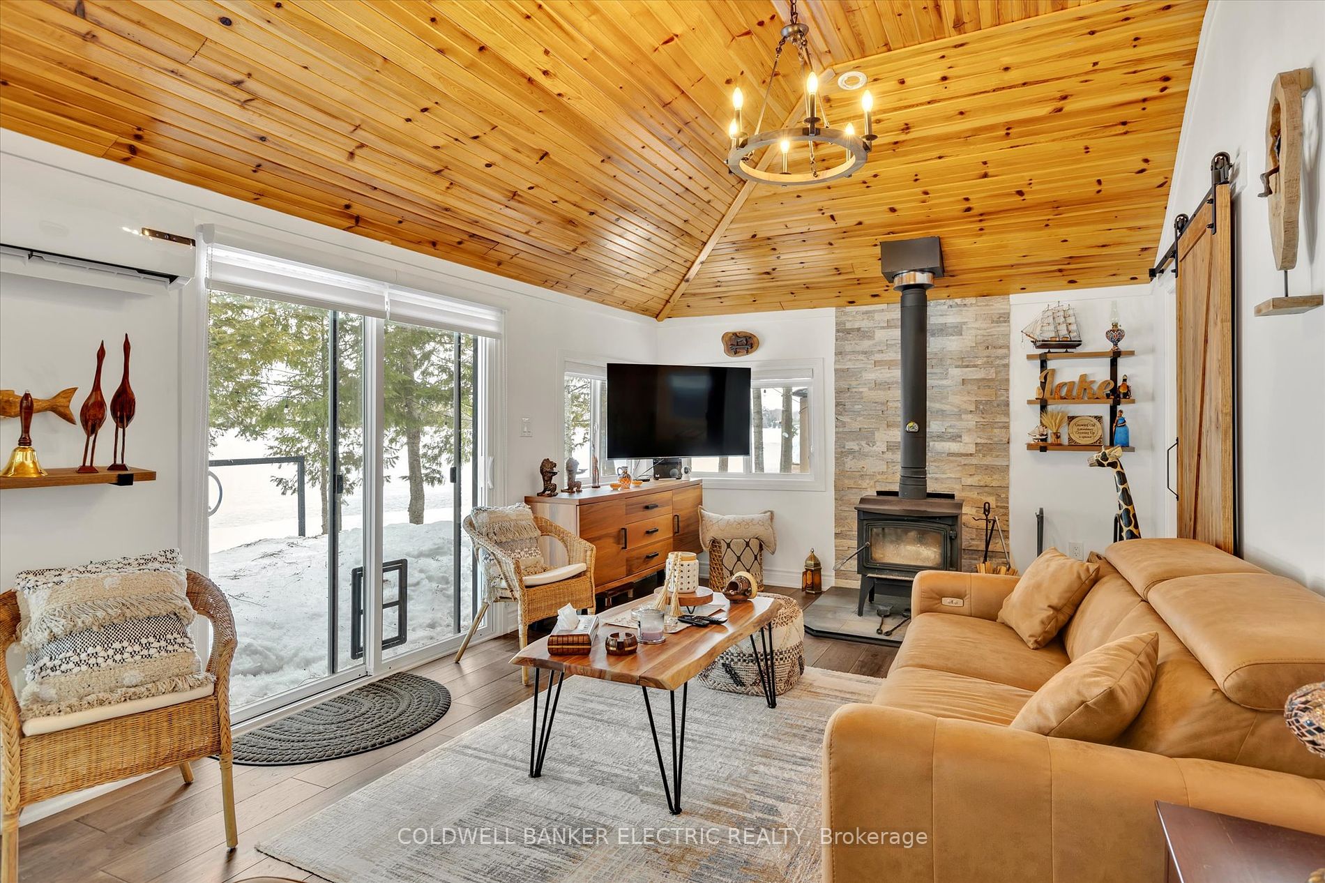 Designer furnishings and large windows with natural light