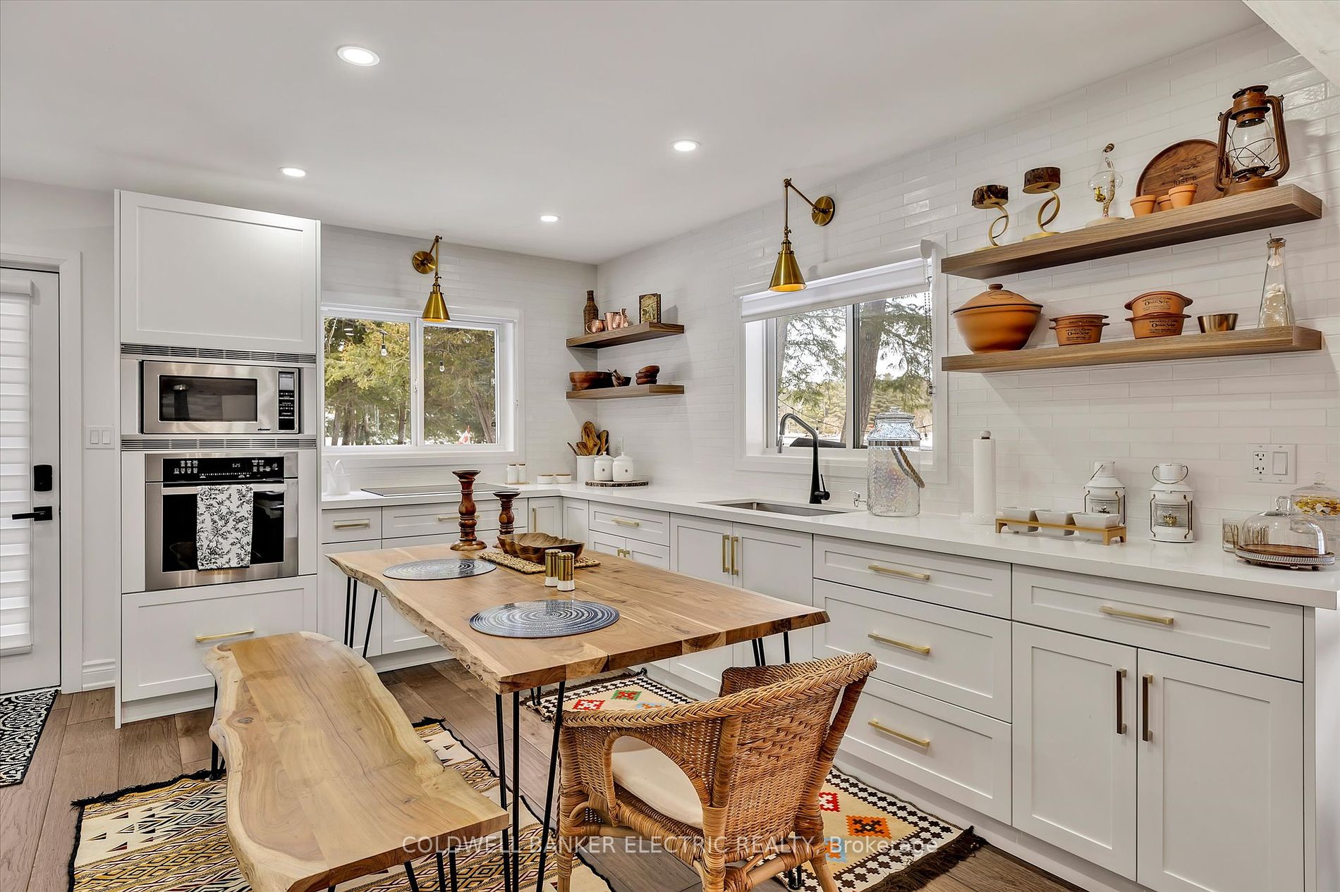 Open-concept dining area with wood accents and recessed lighting