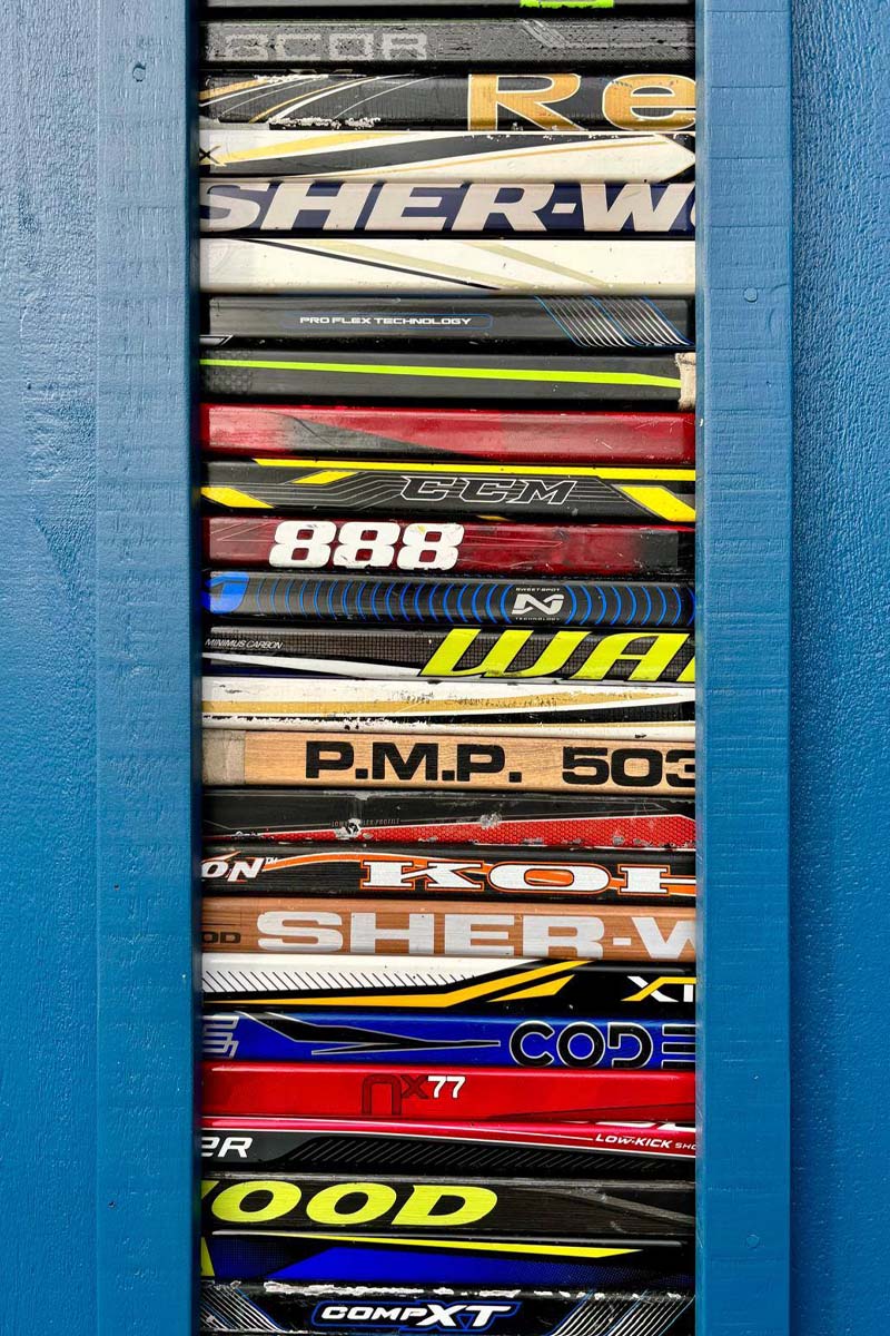 Short, stacked lengths of hockey stick.