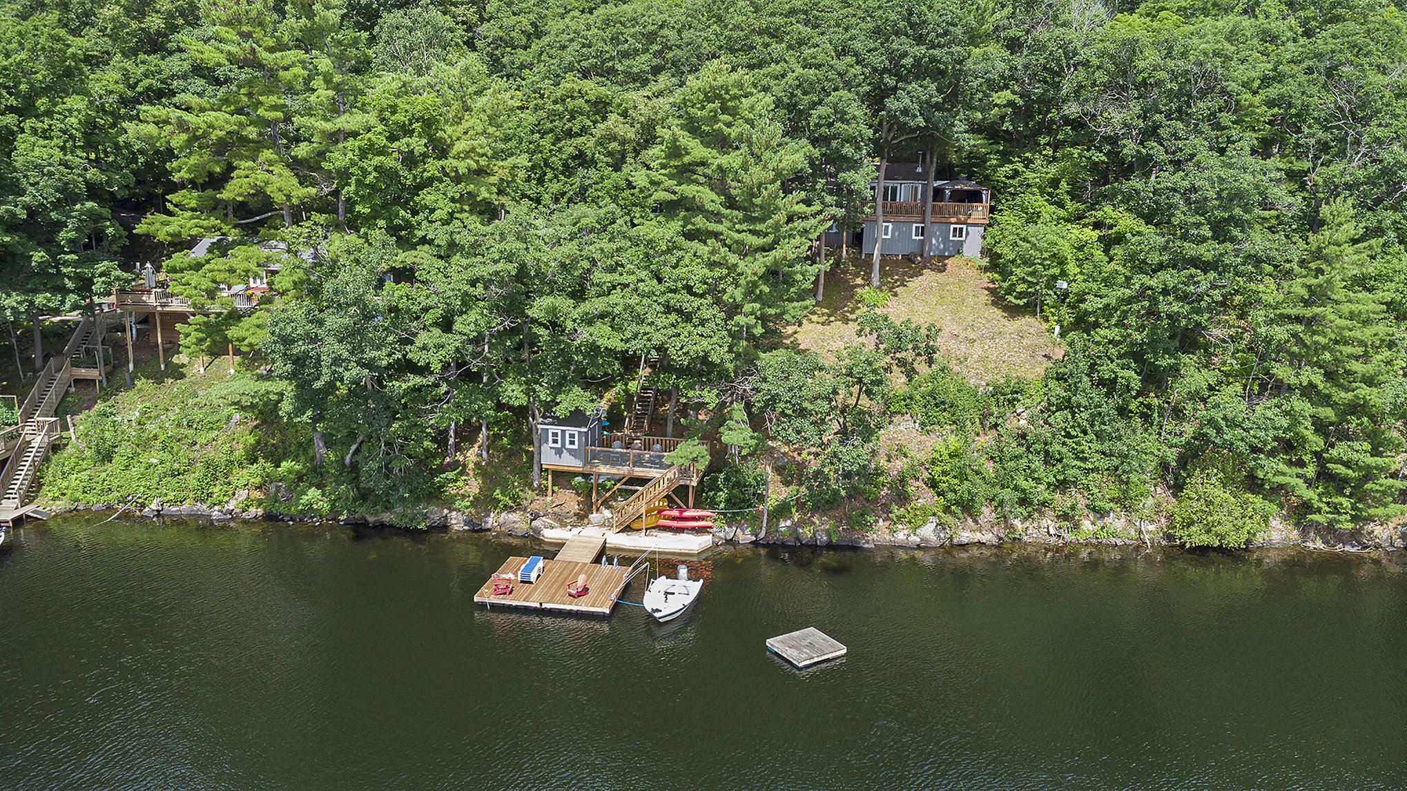 Aerial shot of the property showing the dock system and secluded location on Bobs Lake
