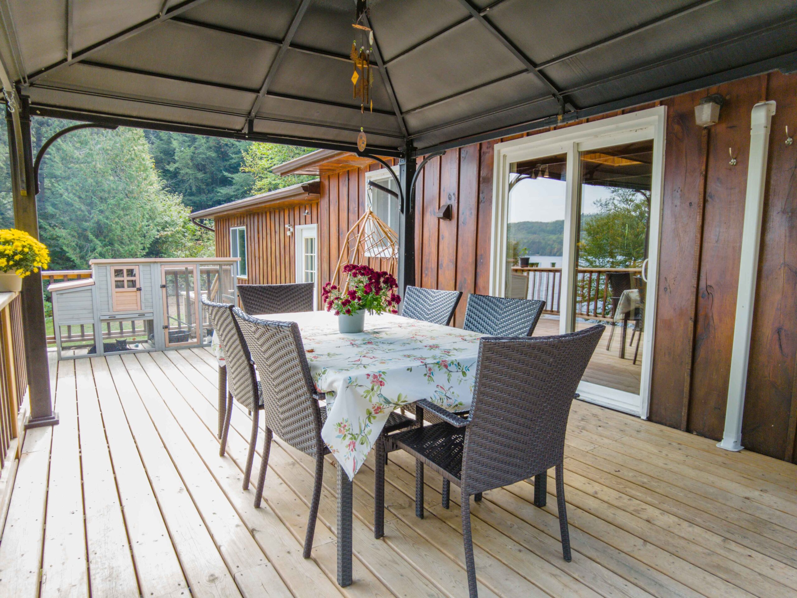 Outdoor dining setup on the cottage deck