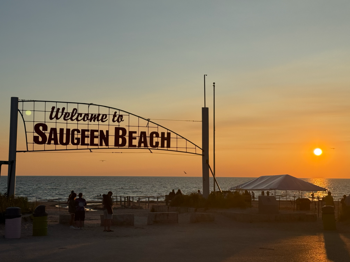 Welcome to Saugeen Beach sign at sunset
