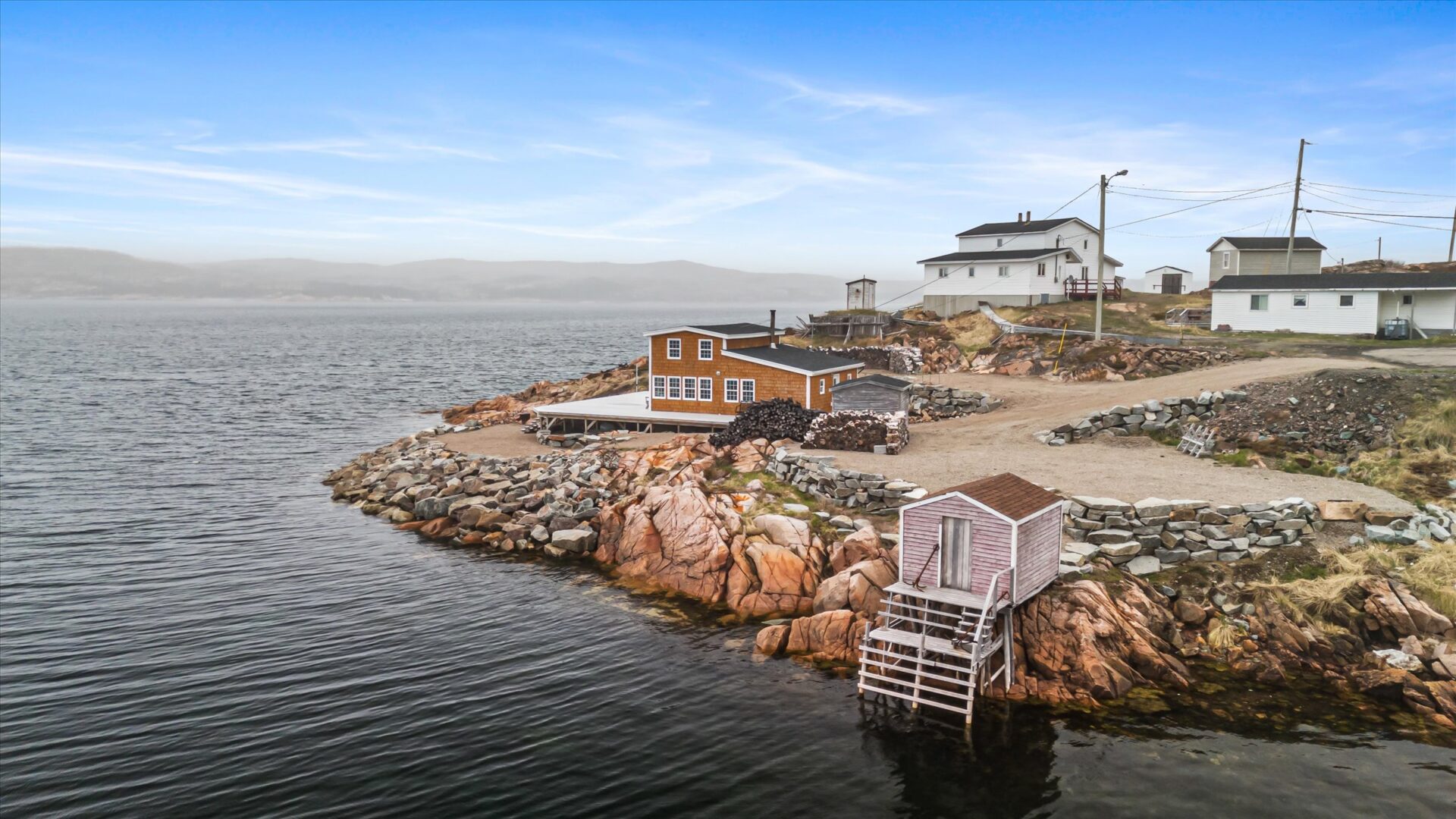 Aerial view of salt box home on Deep Bay