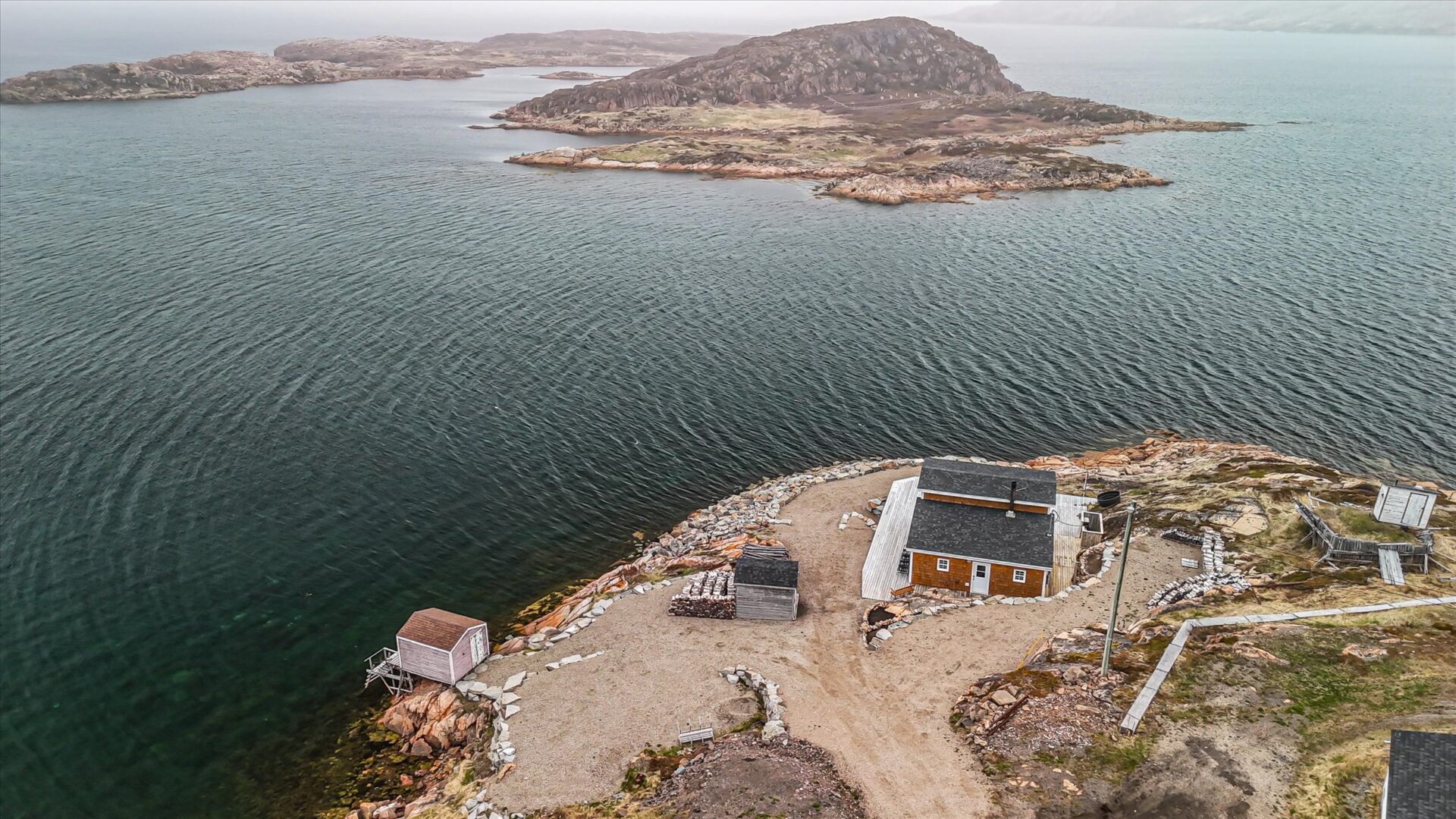 Drone shot of 3 Coles Point with open ocean and island views