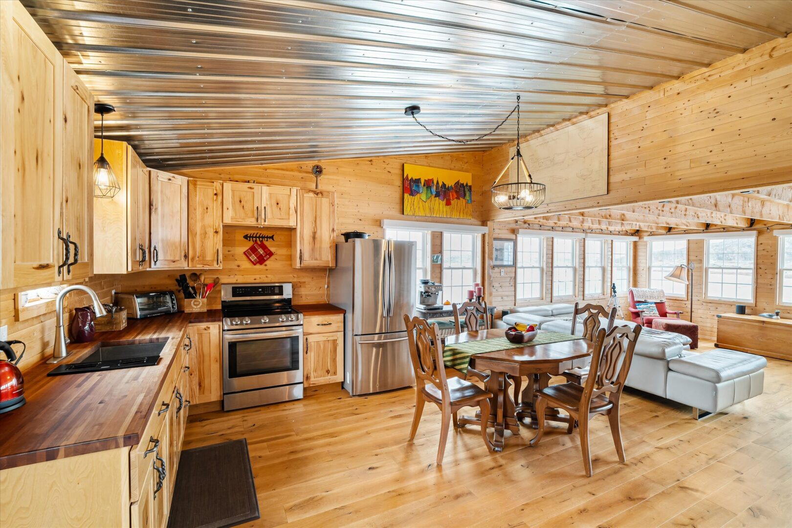 Gourmet kitchen with cherry butcher block counters and handcrafted hickory cabinets