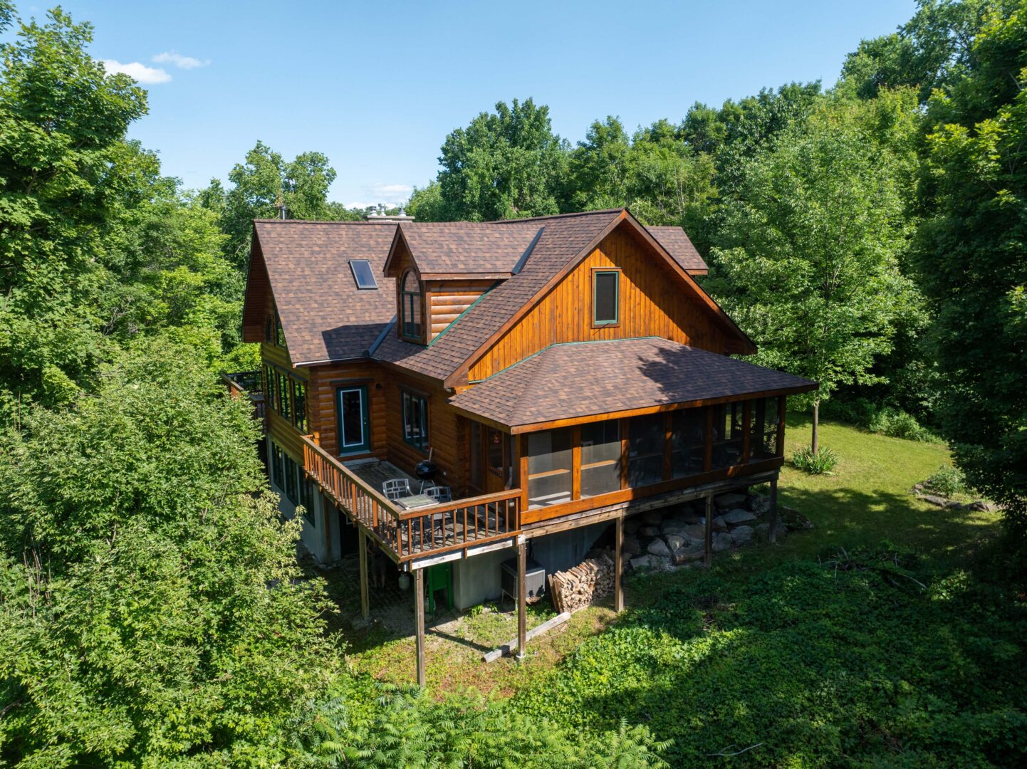 A log cabin nestled in the woods