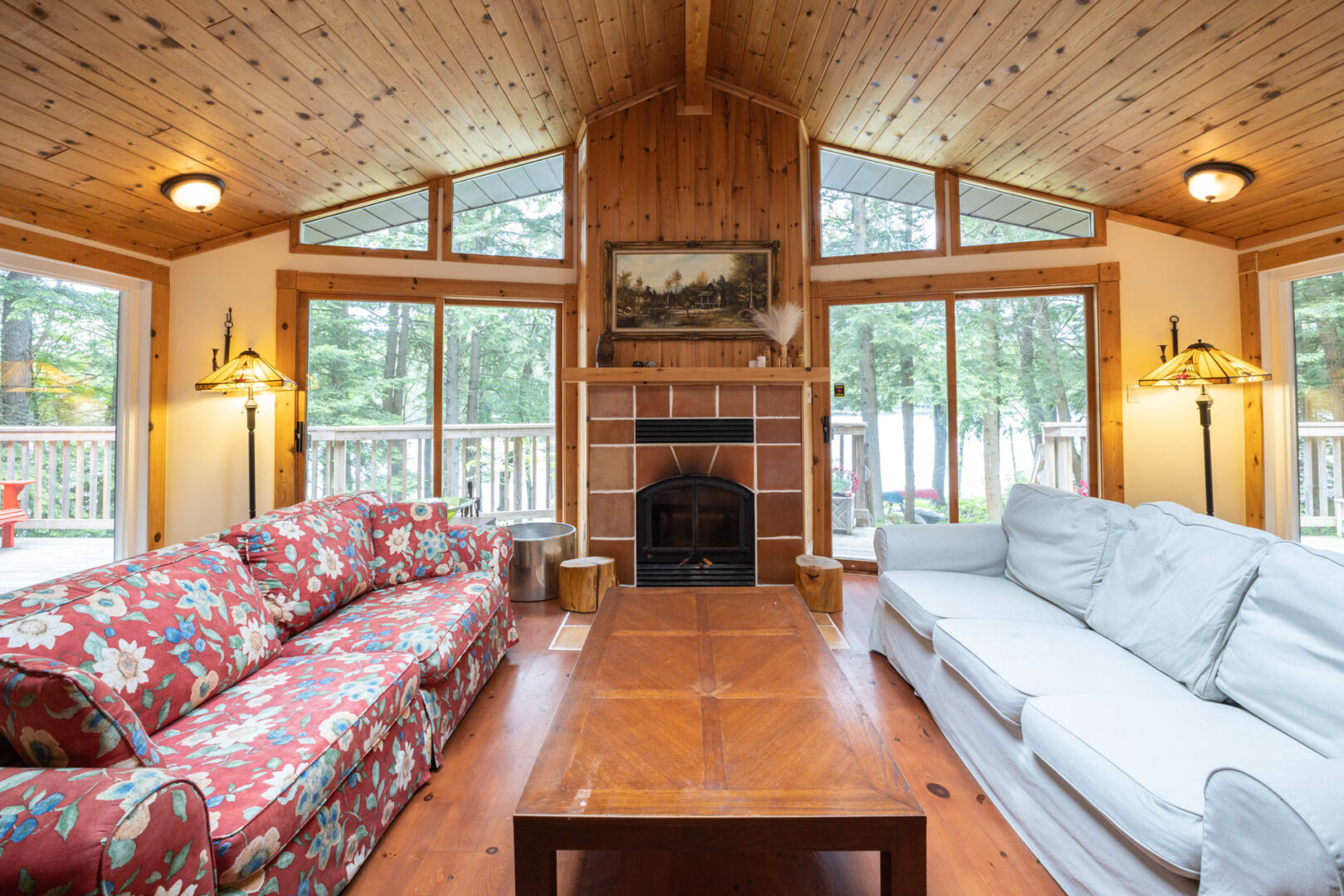 A cottage living room with vaulted ceilings