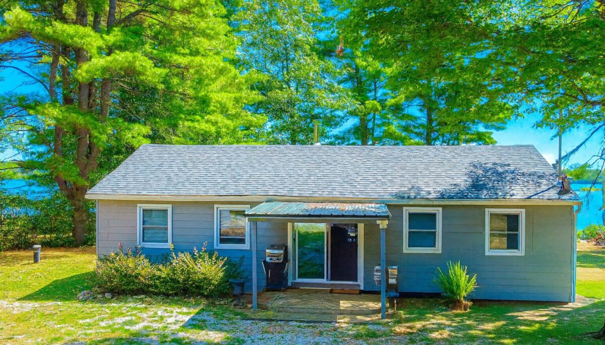 A grey bungalow cottage