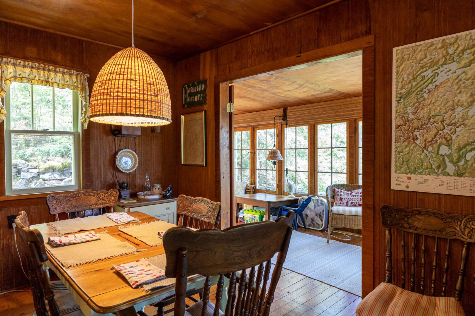 The dining area looks out to the sunroom
