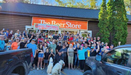 Crowd gathered in front of the Bala Beer Store on the day of its closure