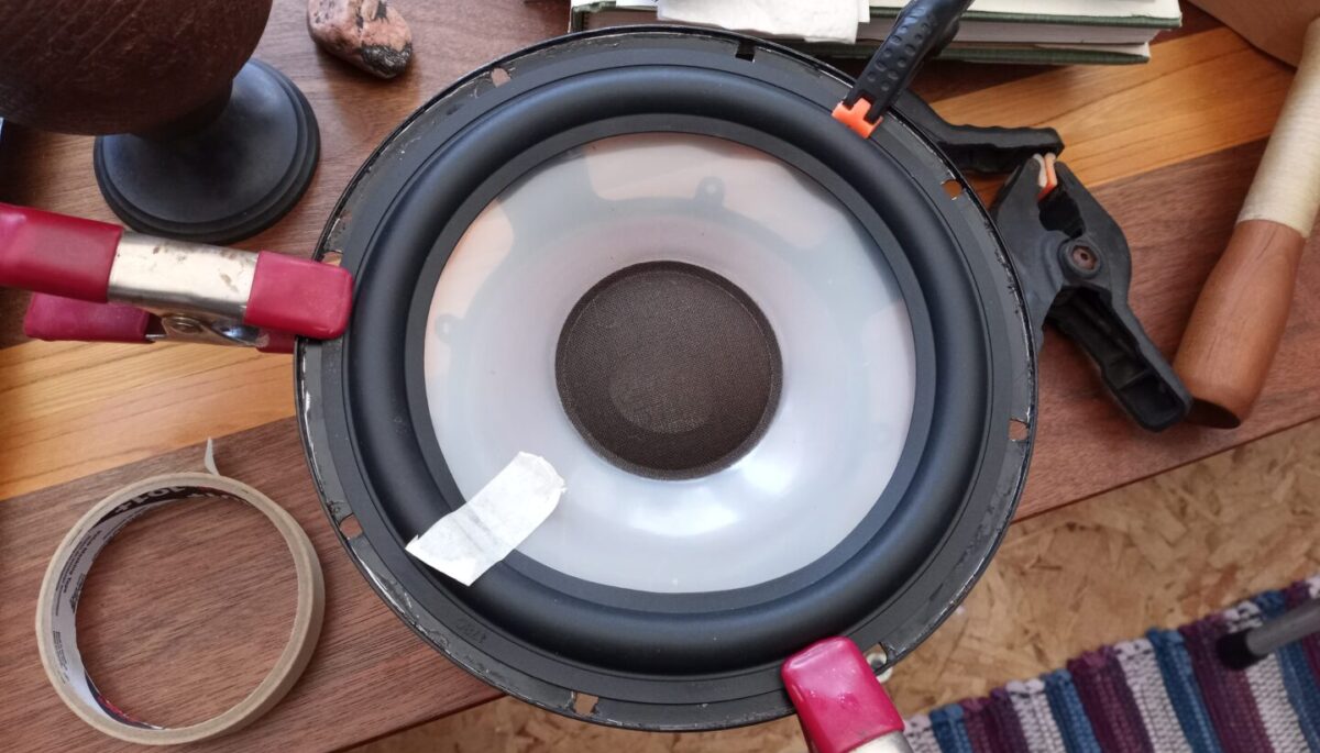 A vintage speaker undergoing repair