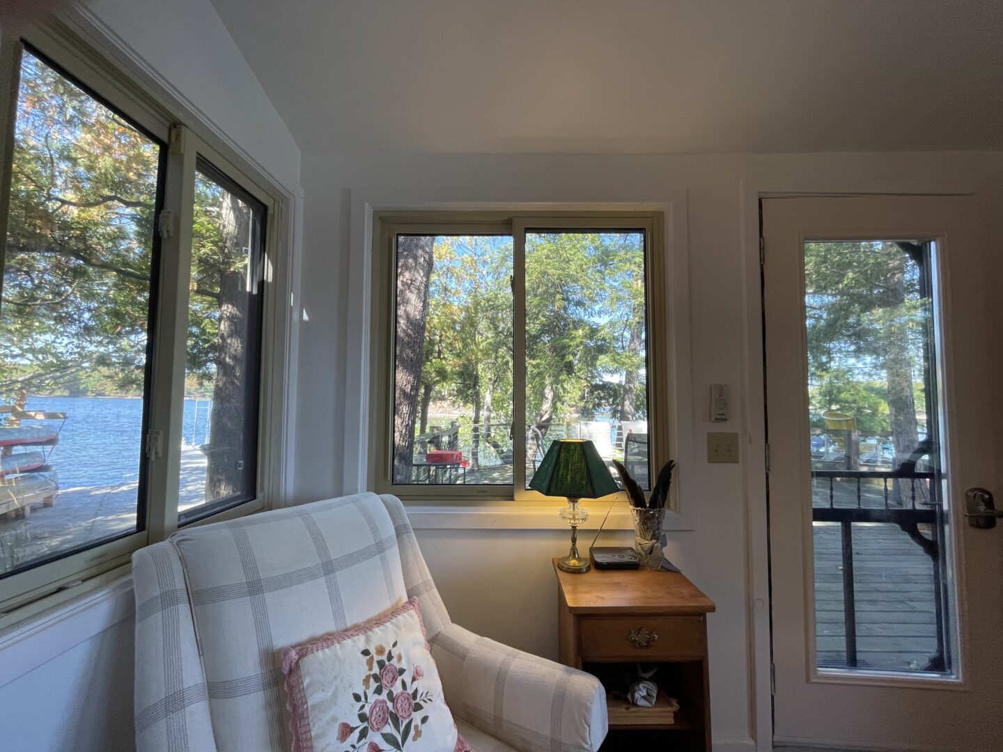 A cream chair in a white sitting area