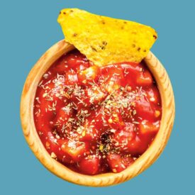 Salsa with a tortilla chip in it