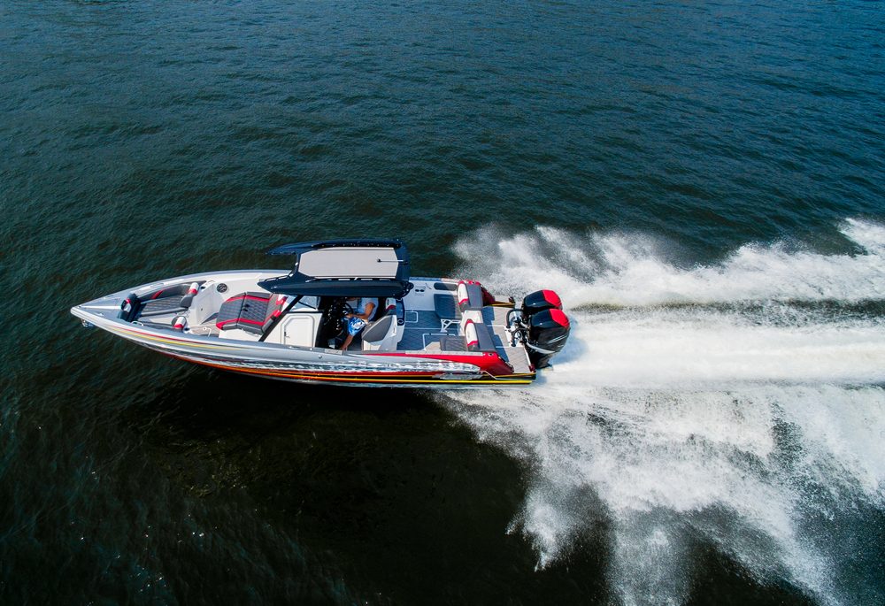 A power boat speeding down the lake