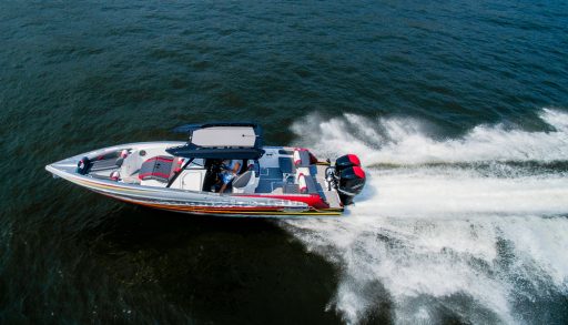 A power boat speeding down the lake