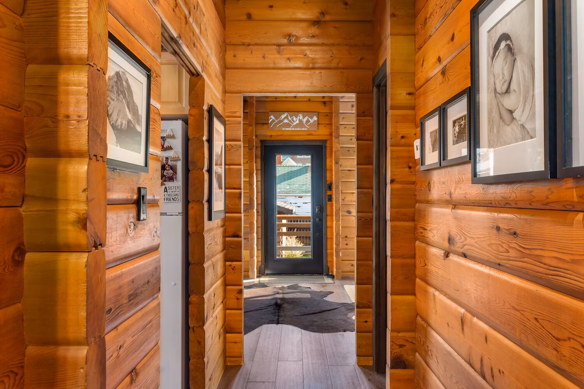 Hallway of Rustic mountain home showcasing its wood interior