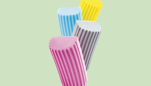 Scrub Daddy damp duster on a green background