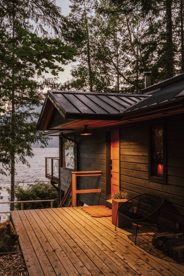 Exterior of cabin on Sproat Lake. It is matte black.