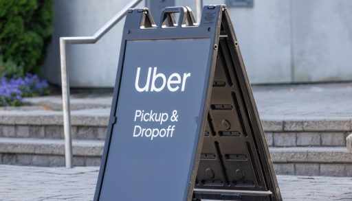 Toronto, Canada, Sept 3, 2024; A parking lot sign for an Uber/rideshare pickup and drop off location
