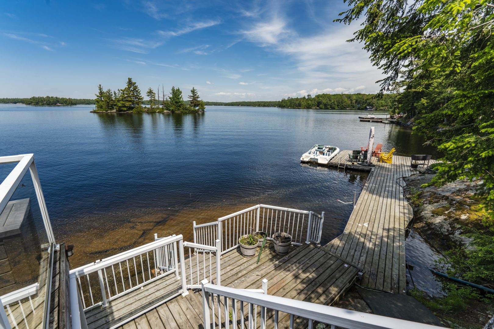 Wood steps lead down to a dock