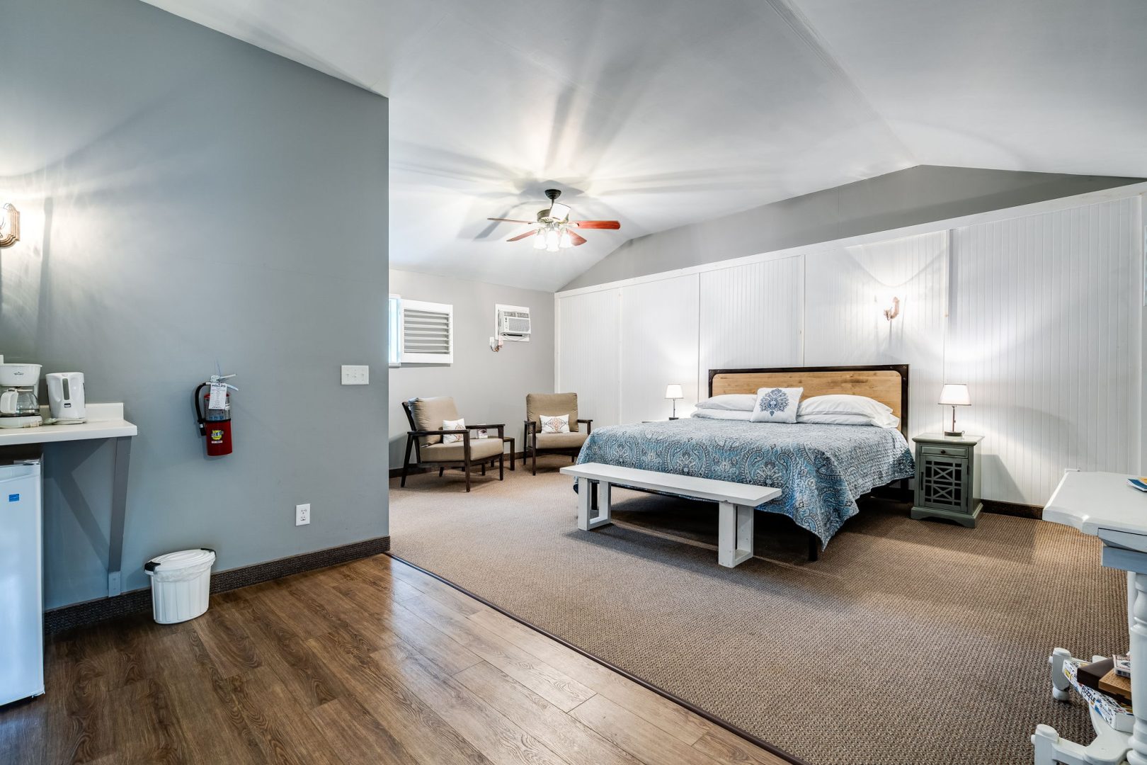 Large bedroom with hardwood floors
