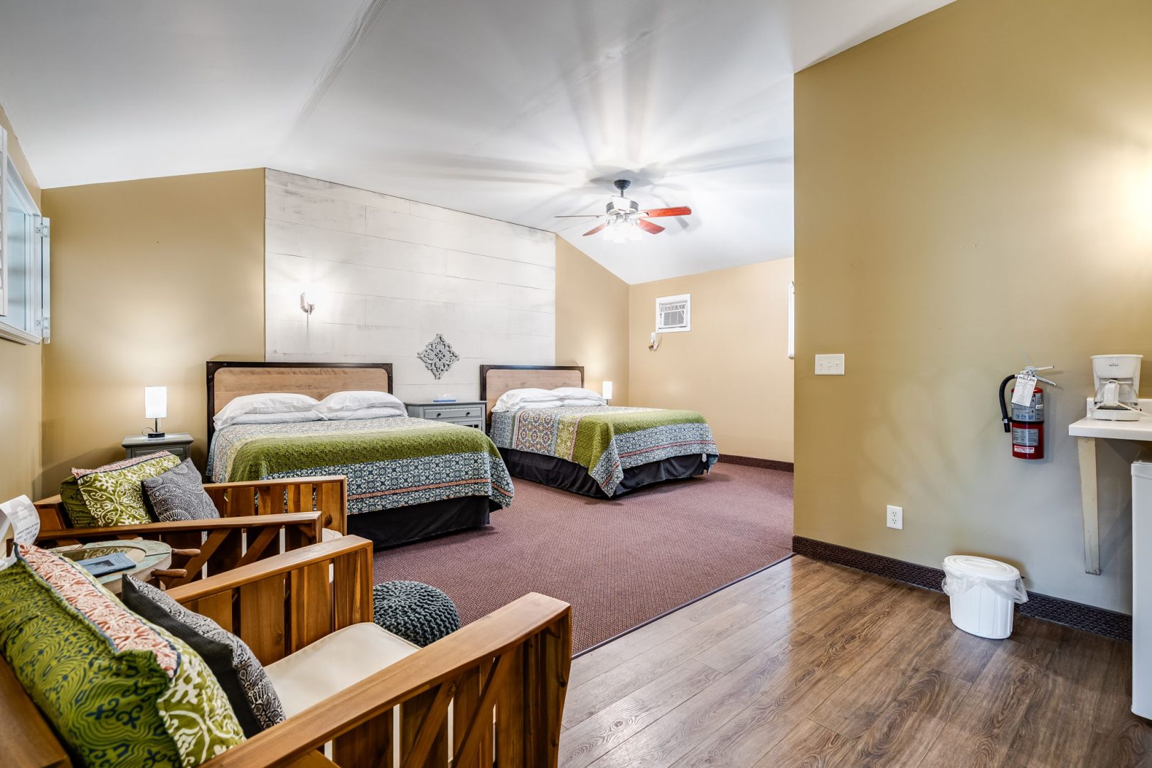 Bedroom with two twin beds and a chair