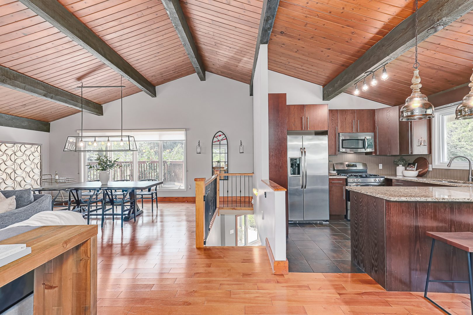 A spacious living area with vaulted ceilings
