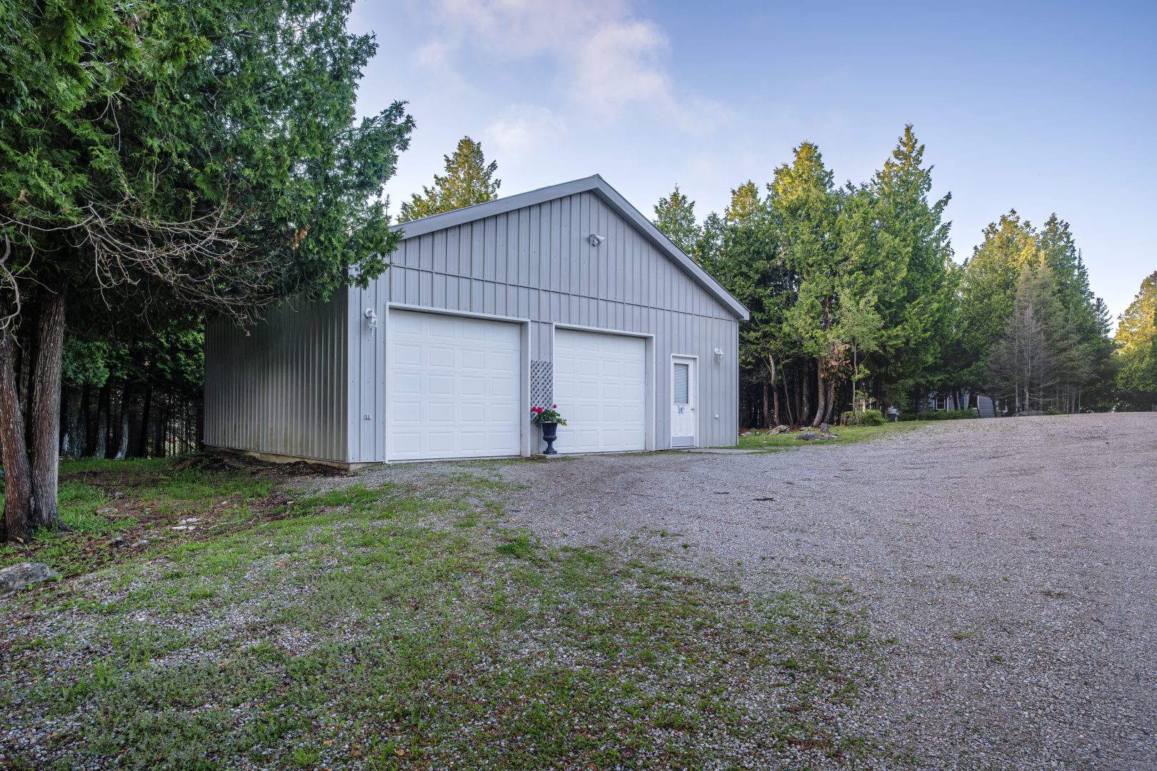 A detached grey garage