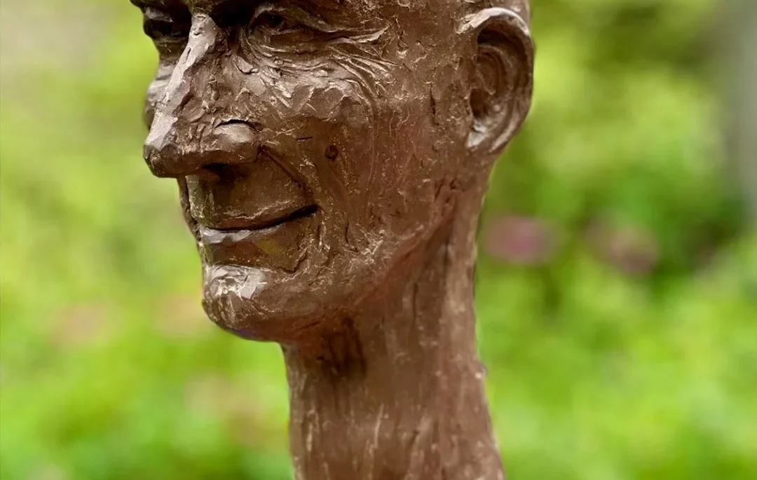 A bronze bust of a man