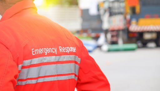 Emergency response person in an orange emergency response jumpsuit