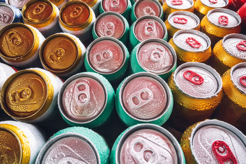 A shot of frosty beer cans from above